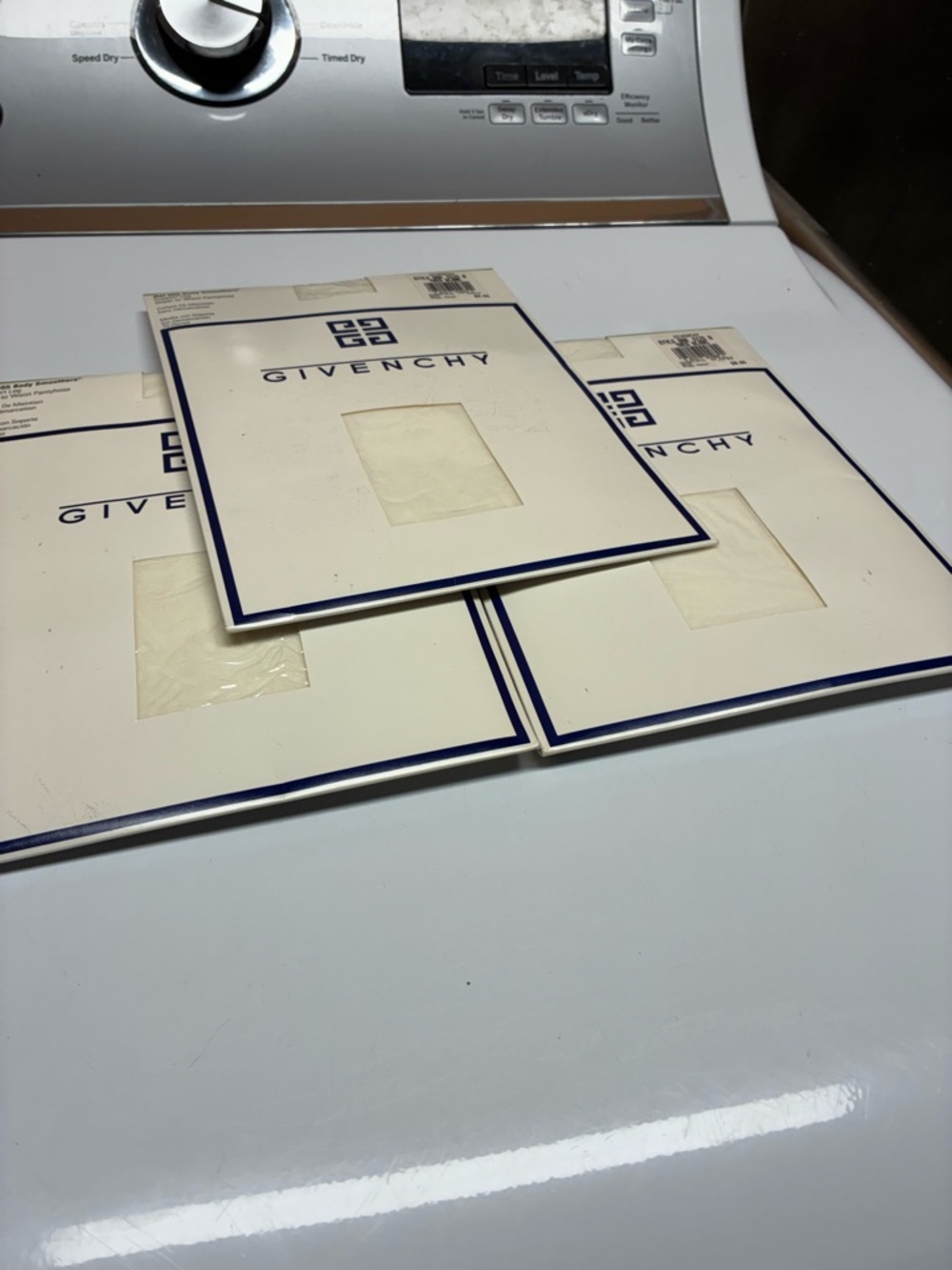 Vintage Givenchy three pair white pantyhose new in package